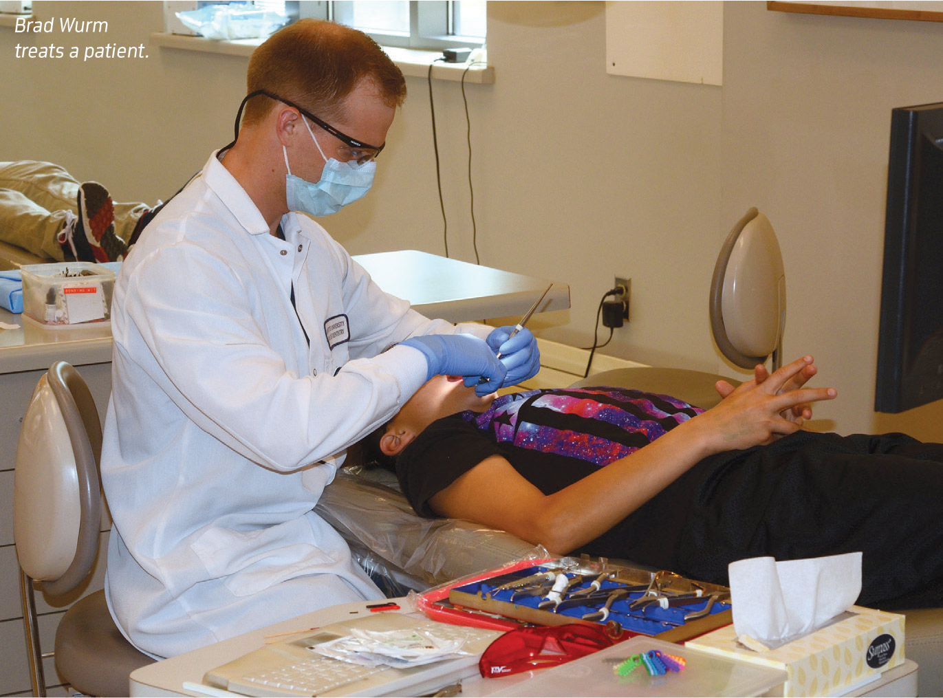 Brad Wurm treats a patient